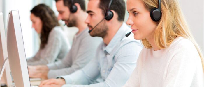 Young attractive woman working in a call center